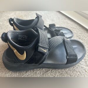 Nike  Black and Gold Sandals